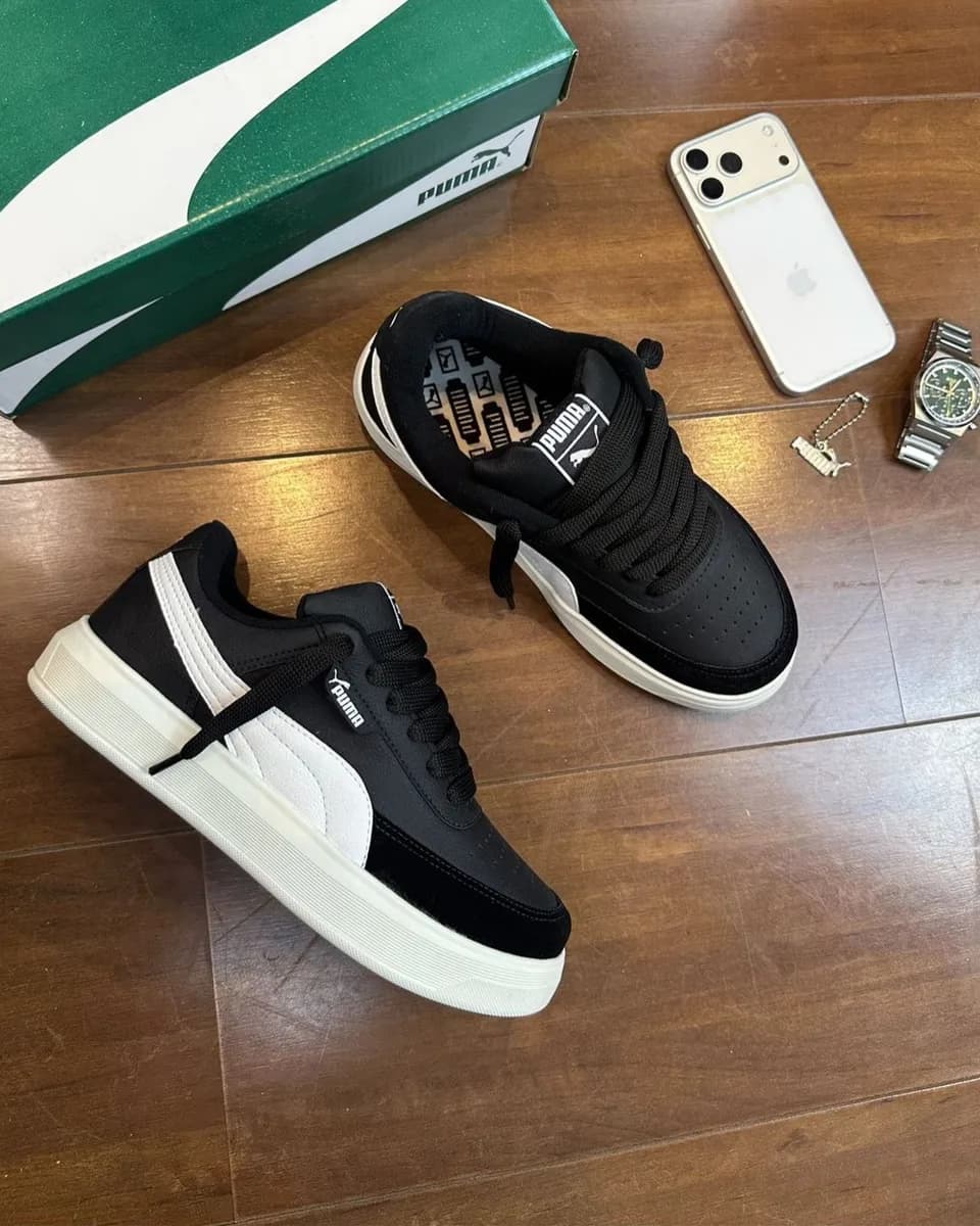 Tênis Puma preto e branco